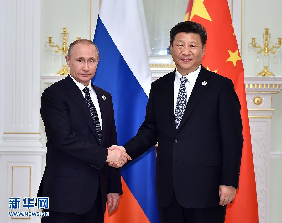 6月23日，國(guó)家主席習(xí)近平在烏茲別克斯坦塔什干會(huì)見俄羅斯總統(tǒng)普京。新華社記者李濤攝